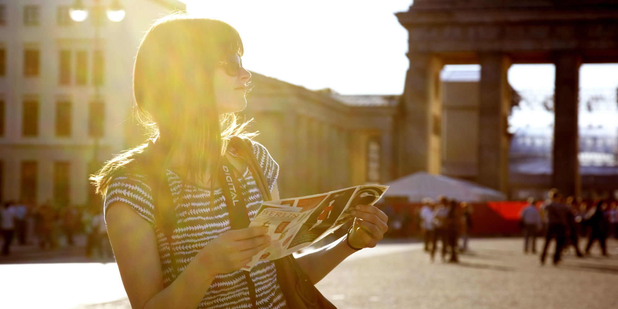 Girl with map at Brandenburger Tor